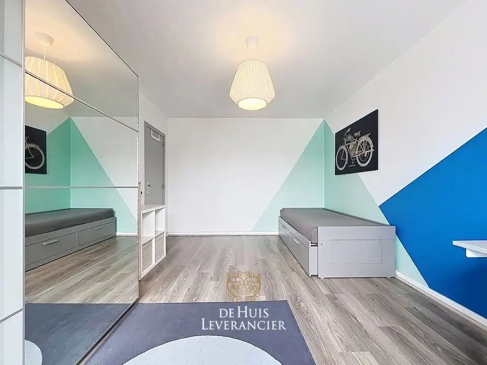 Instapklare rijwoning met tuin op rustige ligging te koop in Lint foto 14
