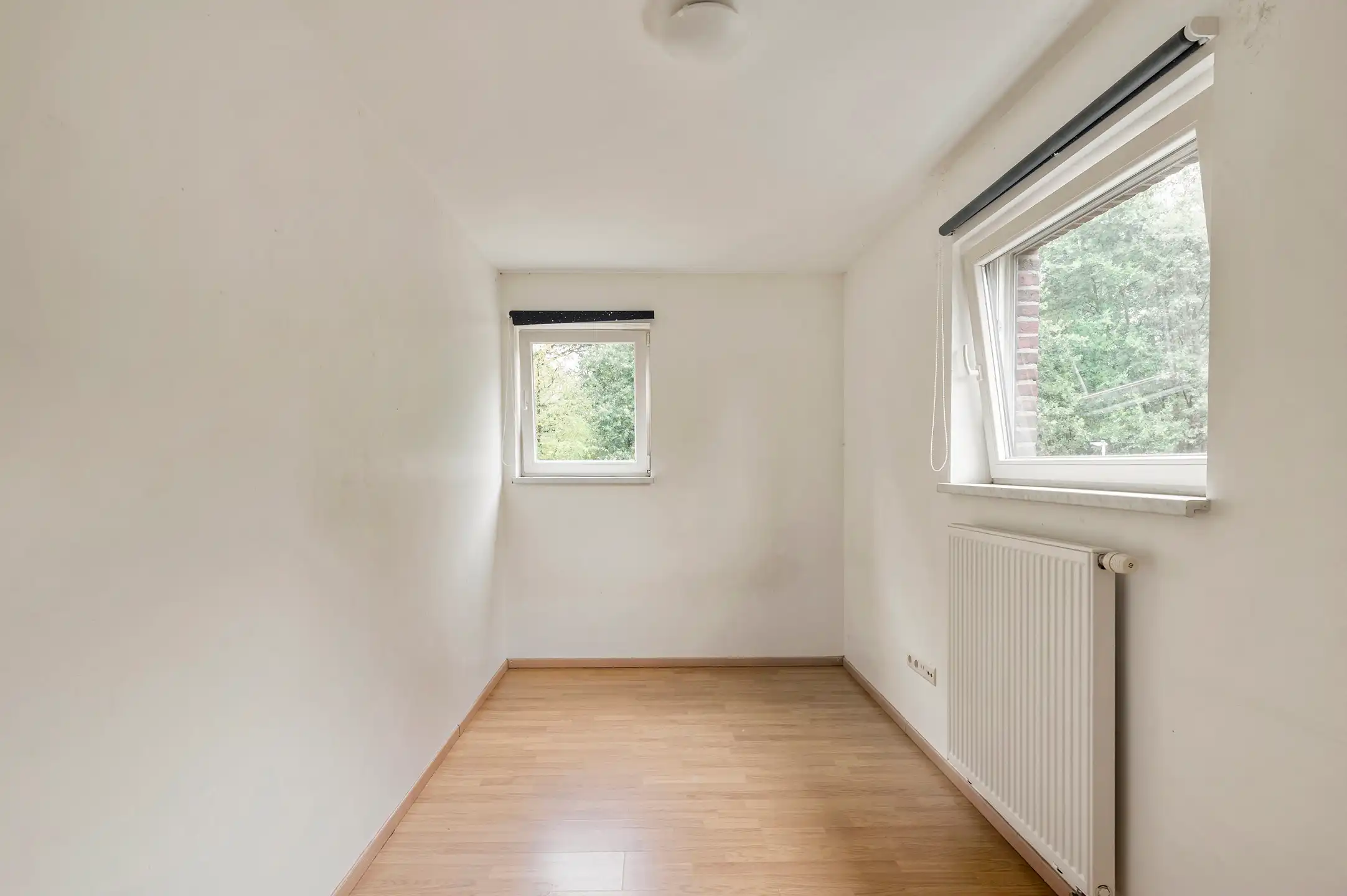 Ruime en lichtrijke gezinswoning met 3 slaapkamers, dressing bureau en aangename tuin foto 23