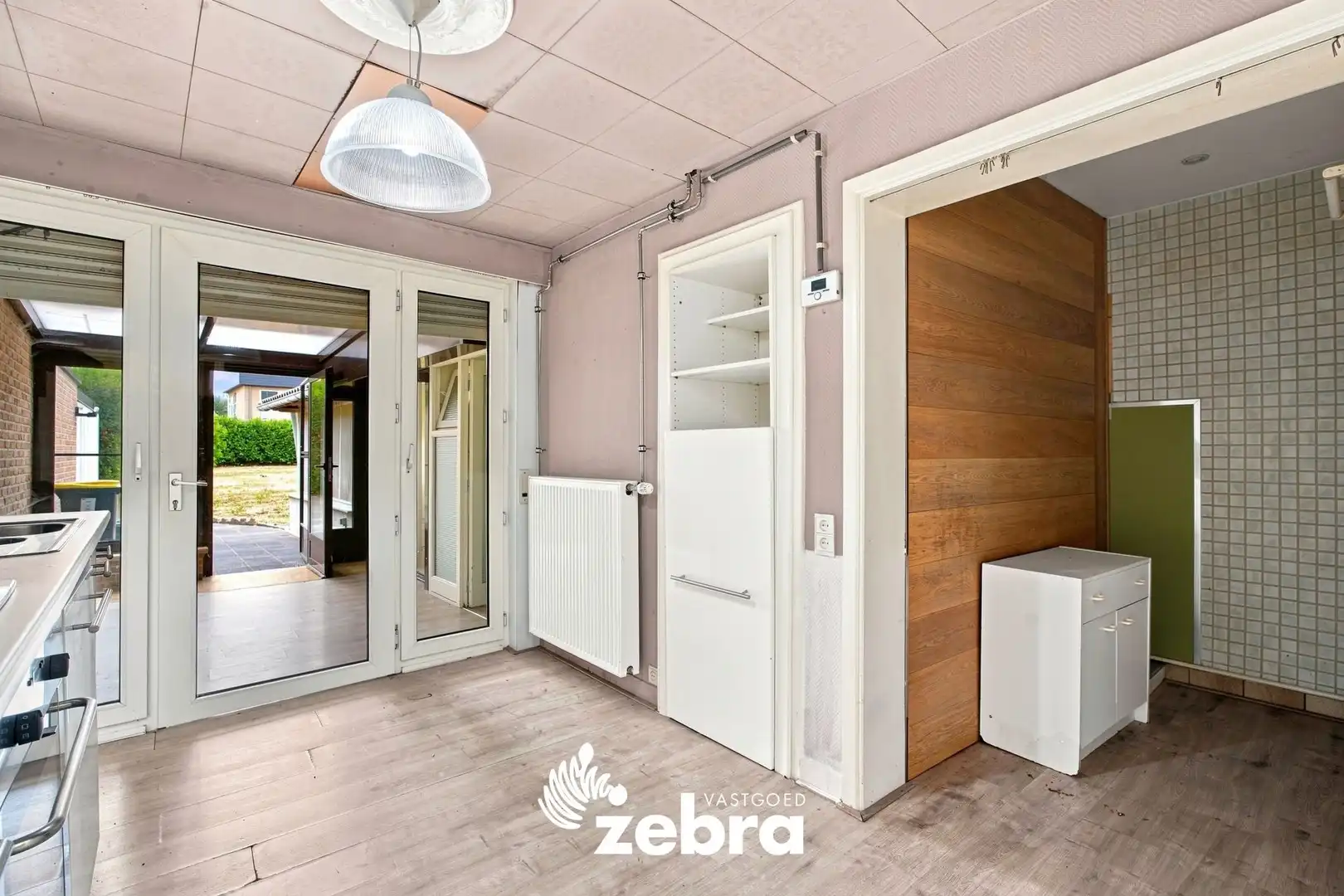 Op te frissen woning met 4 slaapkamers en ruime tuin met uitweg te Tielt! foto 13