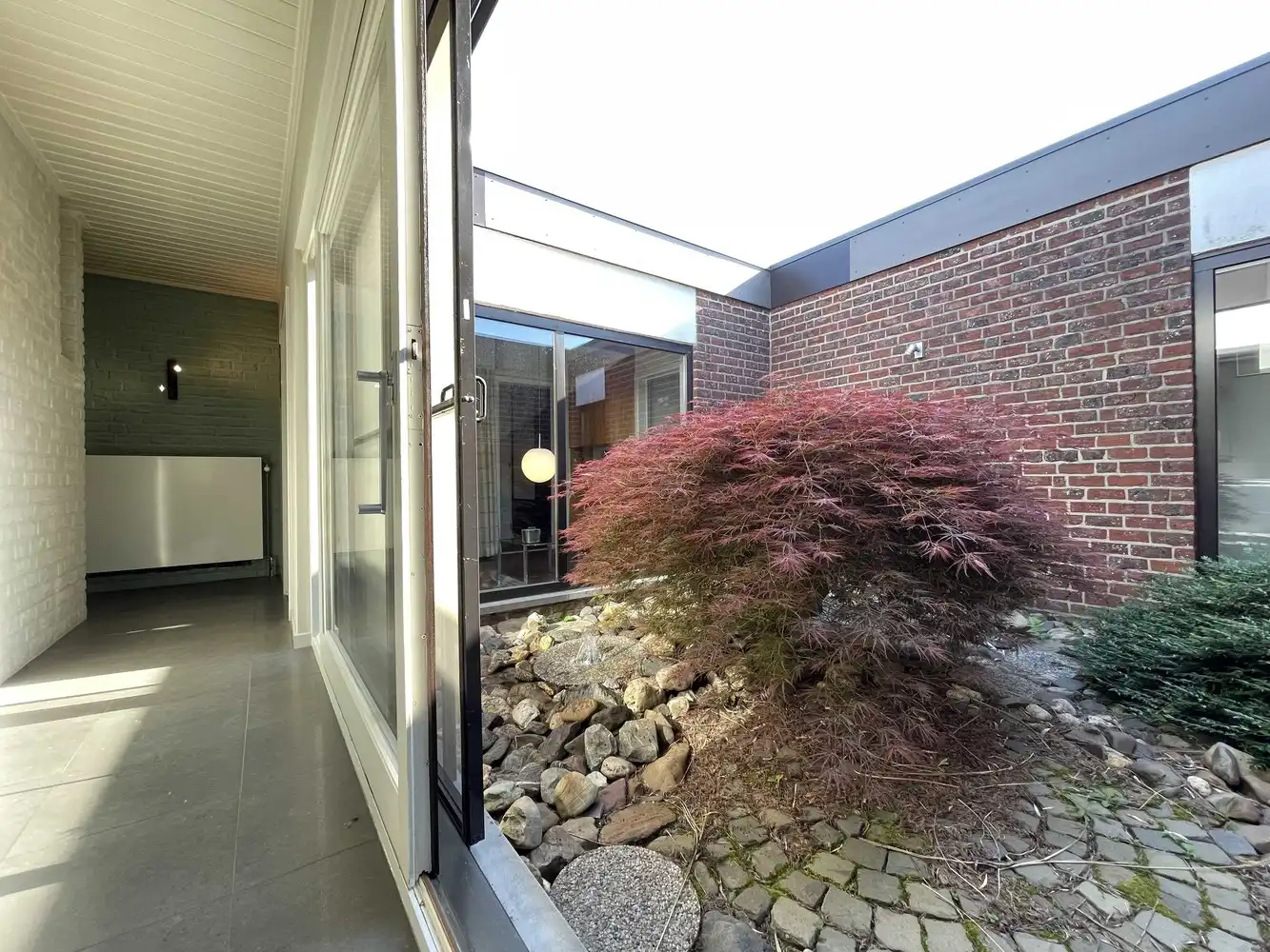 Rustig gelegen vrijstaande woning met zonovergoten tuin foto 3