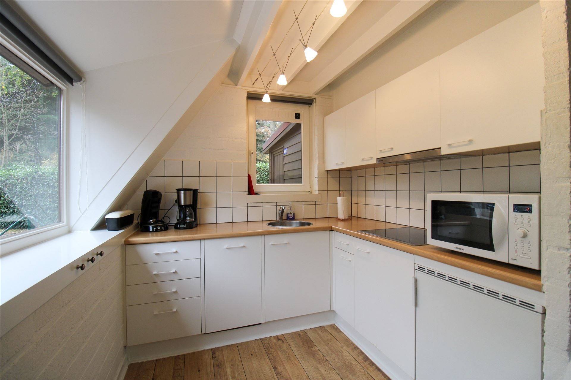 Vakantiewoning met 3 slaapkamers en ruime tuin op vakantiedomein Sonnevijver te Rekem! foto 5