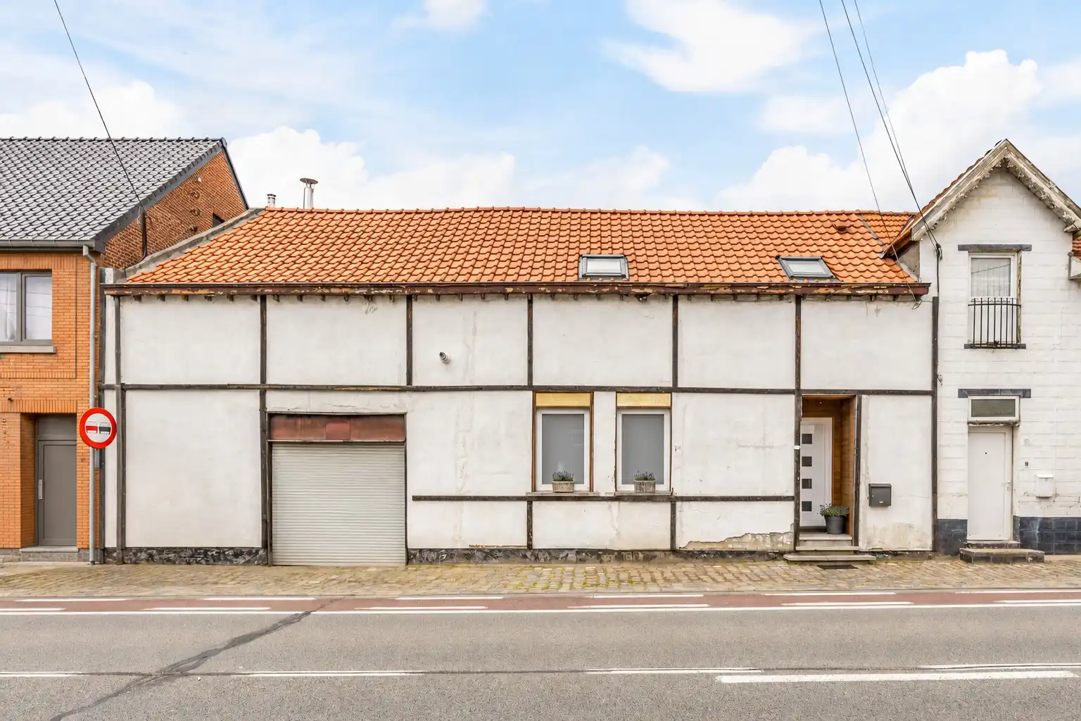 Karaktervolle hoevewoning met 3 slaapkamers, gezellige binnenkoer en tuin op een perceel van 370 m². foto 2