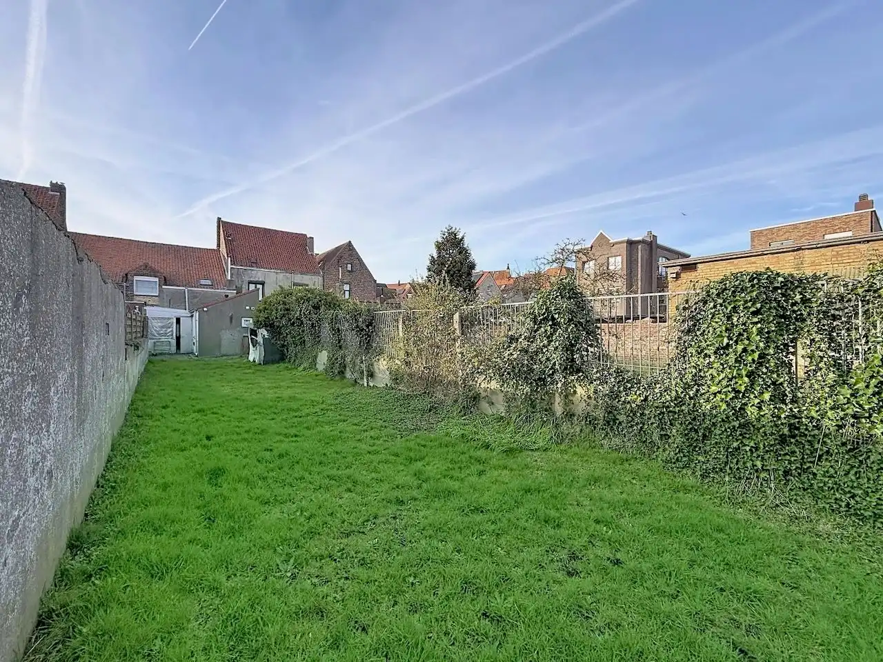 Charmante rijwoning met grote tuin en garage inhuis foto 24