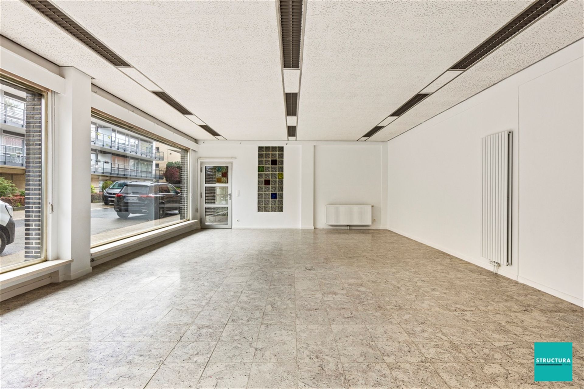 Gelijkvloers appartement met commerciële ruimte  foto 2