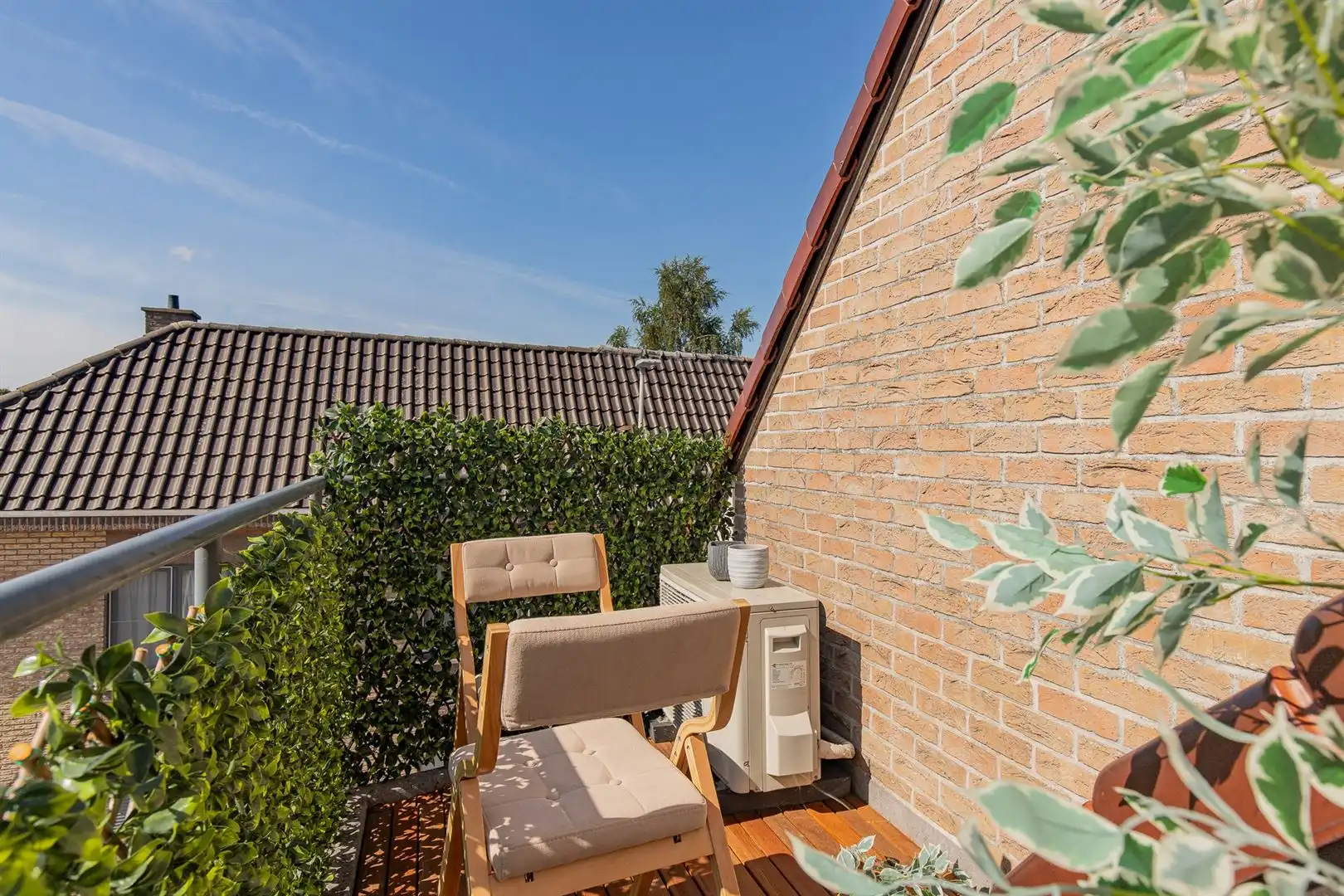 Instapklaar dakappartement met terras en EPC-label A in Beveren foto 16