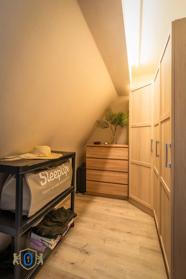 Charmante tussenwoning met tuin foto 17