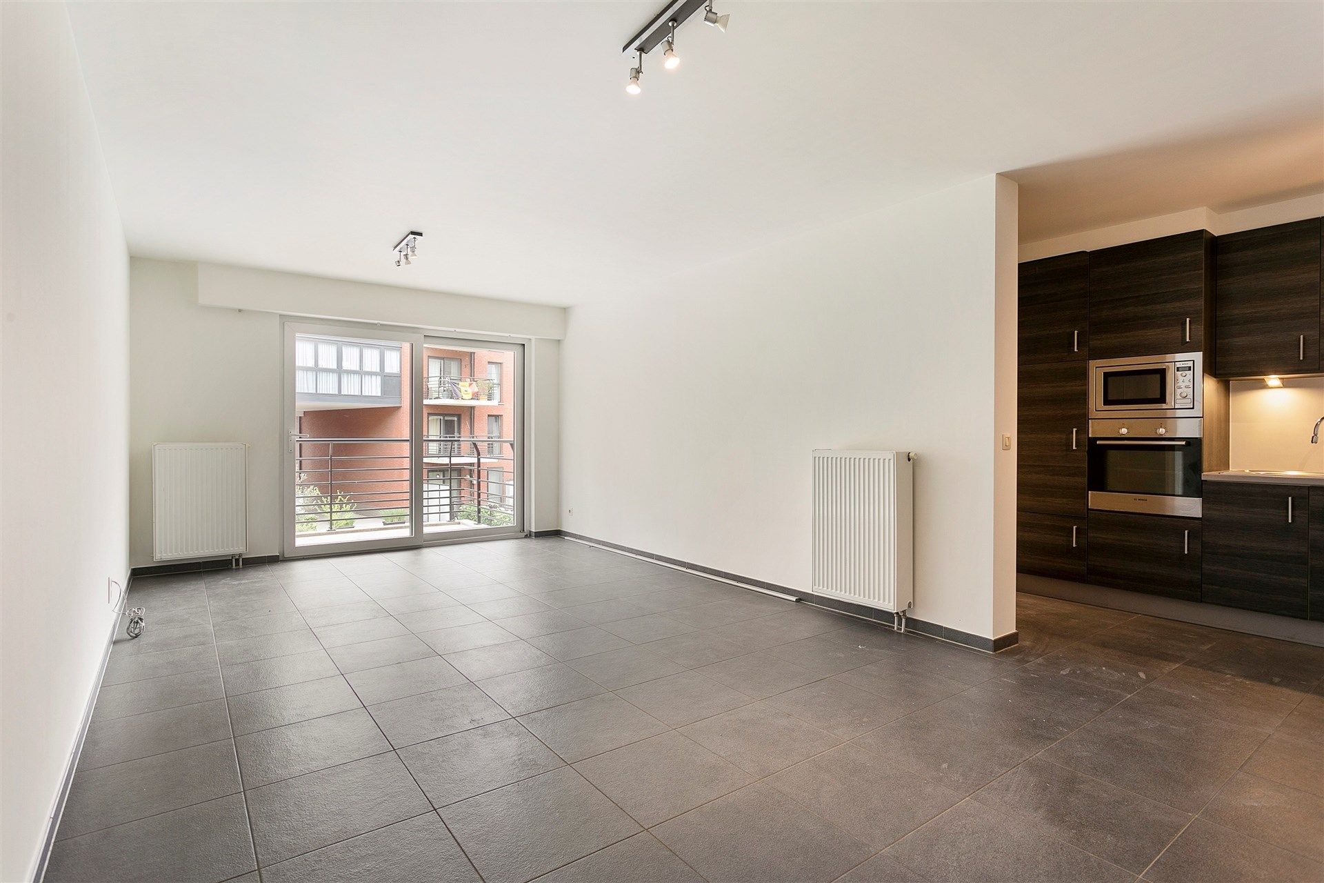 Gunstig gelegen lichtrijk energiezuinig 2 slaapkamer appartement met staanplaats foto 2