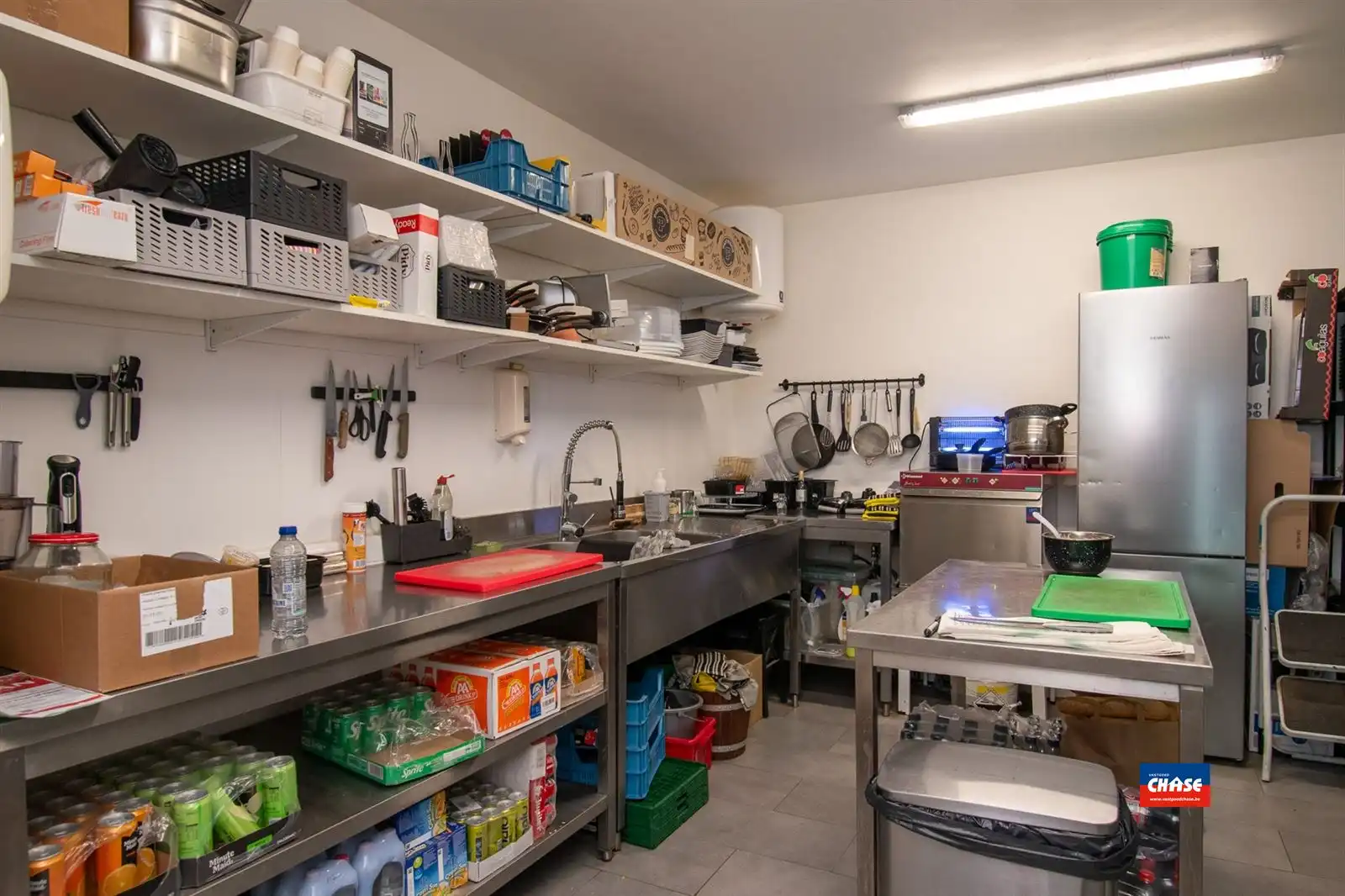 Handelspand met appartement en garagebox foto 7