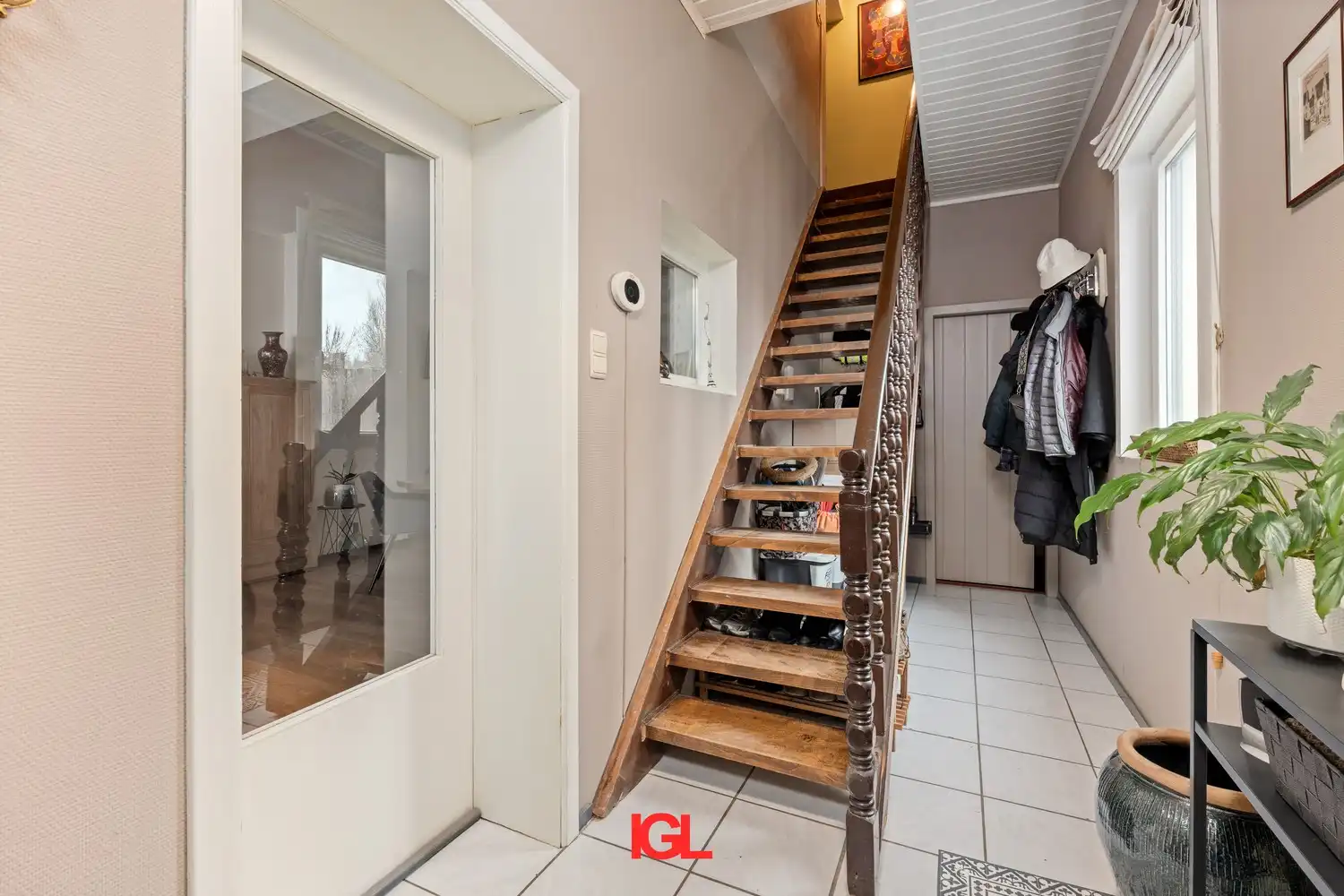 Charmante en instapklare 3‑gevelwoning met grote tuin in Beersel foto 13