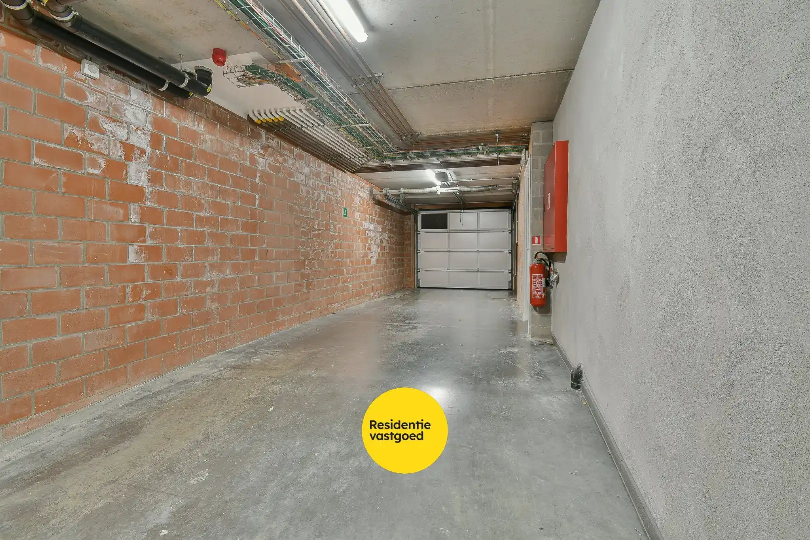 Private autostaanplaats in afgesloten complex te Bredene foto 3