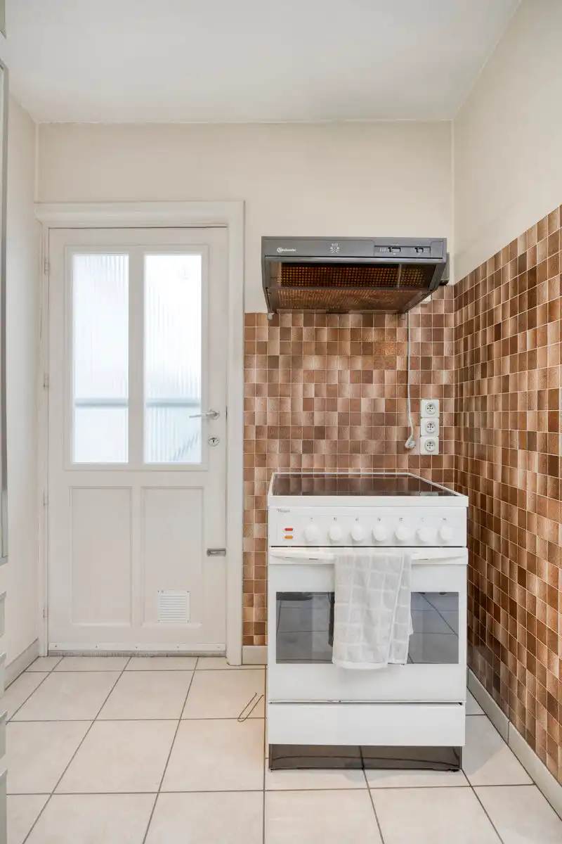 Rijwoning met 2 slaapkamers, inrichtbare zolder & grote tuin foto 10