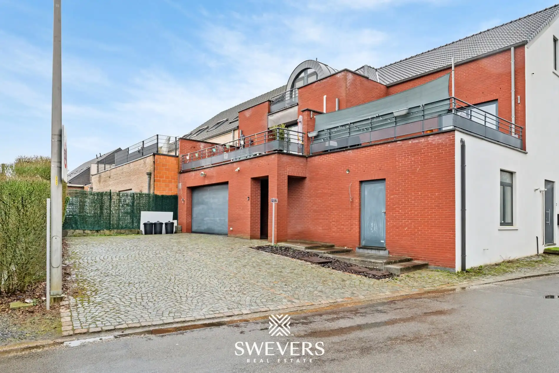 Zonnige bel-etage met dubbele garage en groot terras vlakbij het centrum van Heusden foto 23