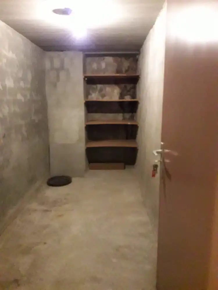 Volledig gerenoveerd gelijkvloers appartement met terras, berging en afgesloten garage foto 15