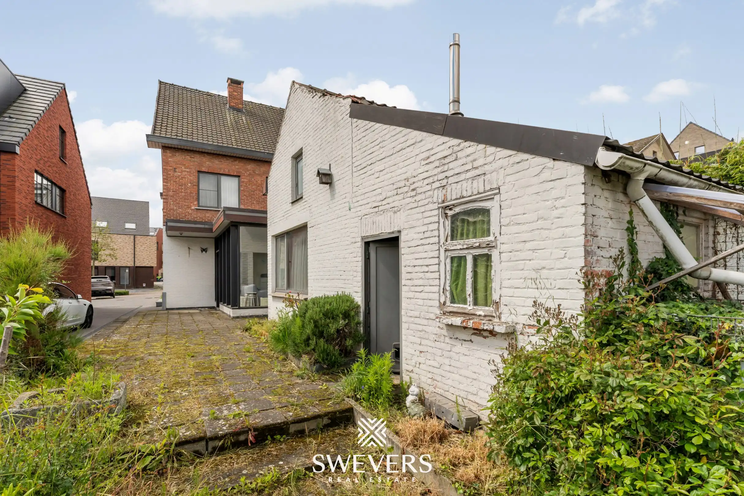 Statige woning met veel potentieel in het centrum van Diepenbeek foto 22