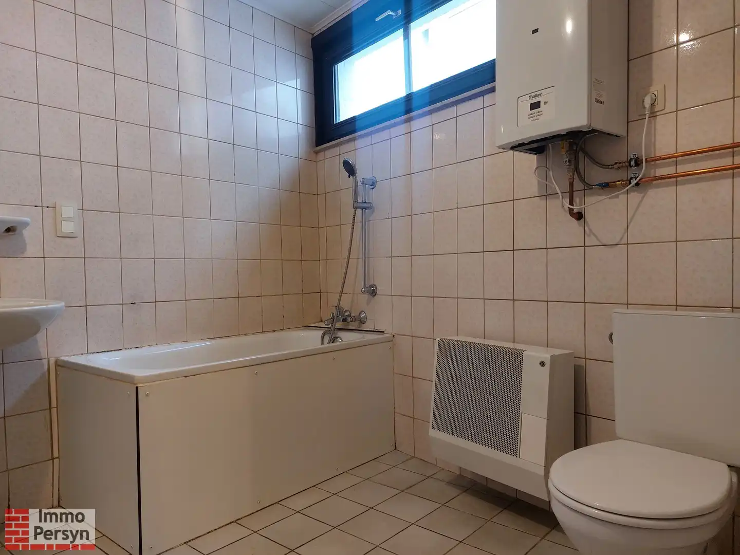 Gezellige rijwoning met 3 slaapkamers en tuin te Schaffen foto 9