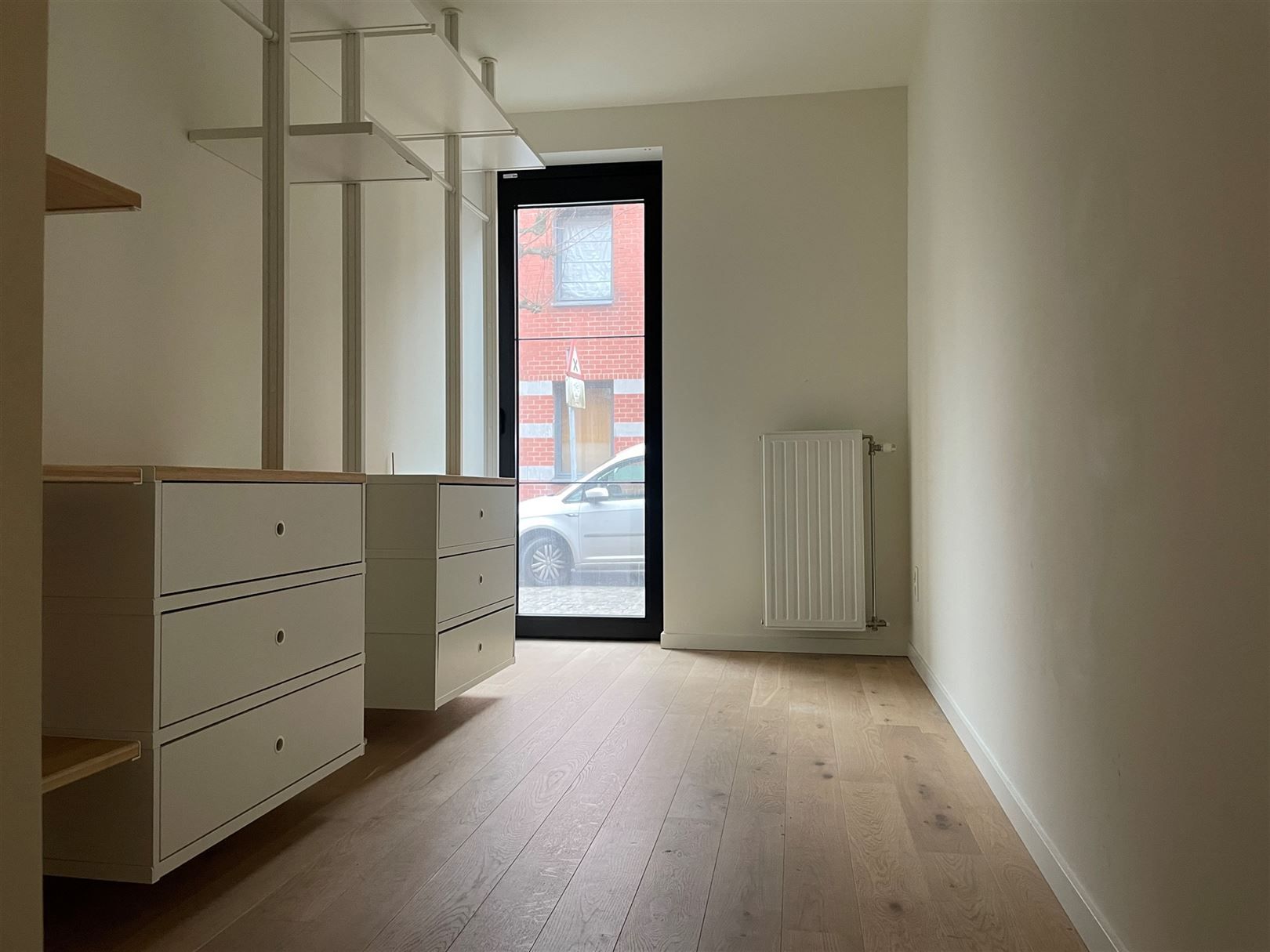 Gelijkvloers appartement met zonnig tuintje. foto 11