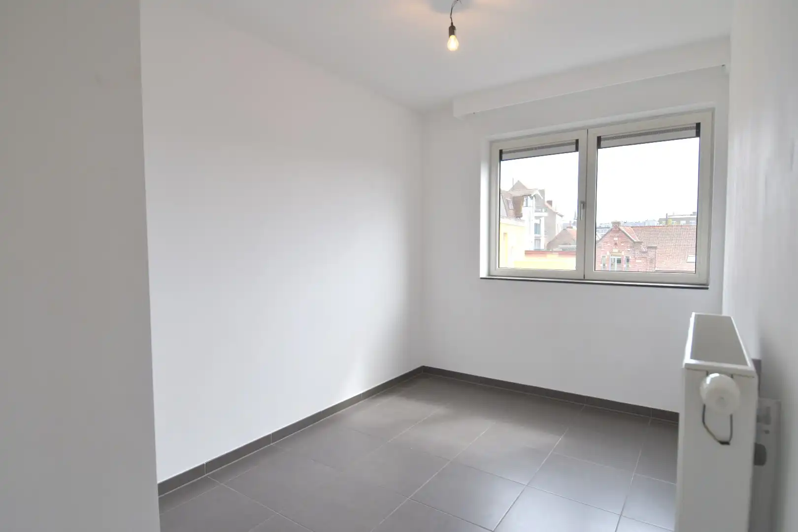 Instapklaar 2-slaapkamerappartement op toplocatie nabij het centrum van Kortrijk foto 11