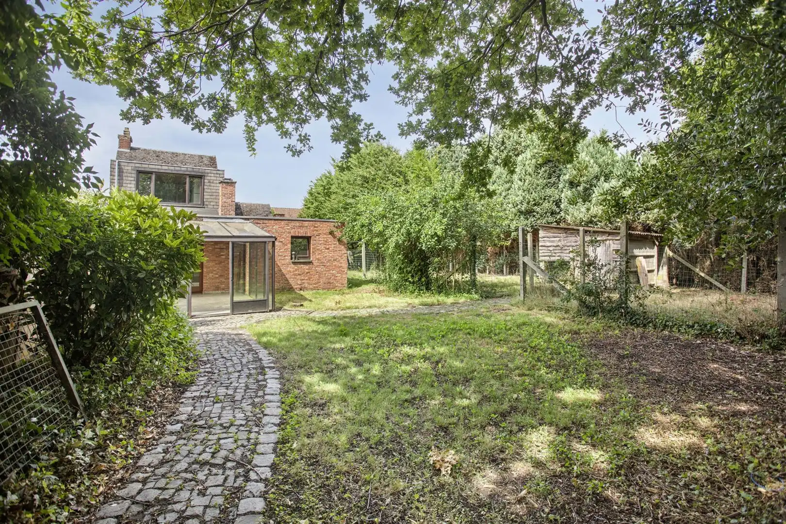 TE KOOP: Te renoveren woning op een perceel van 11a33ca! foto 24