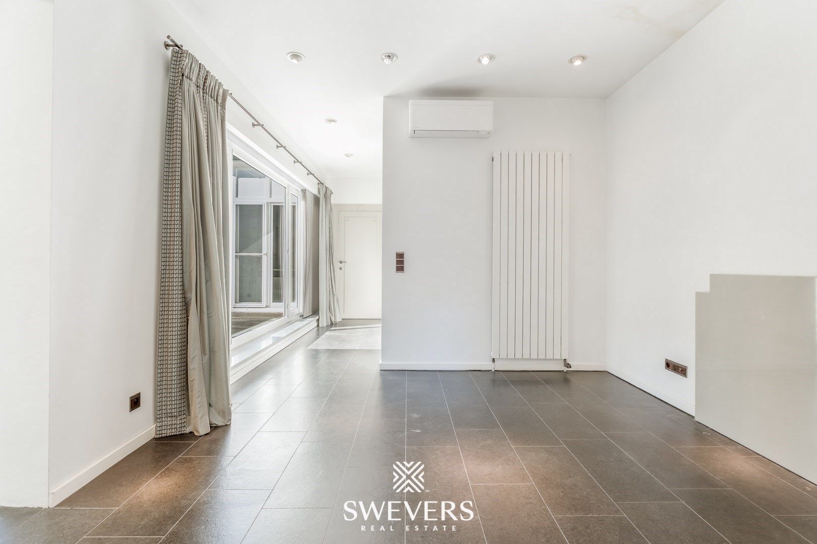 Handelspand met ruime woning in hartje Lummen – een unieke opportuniteit foto 17