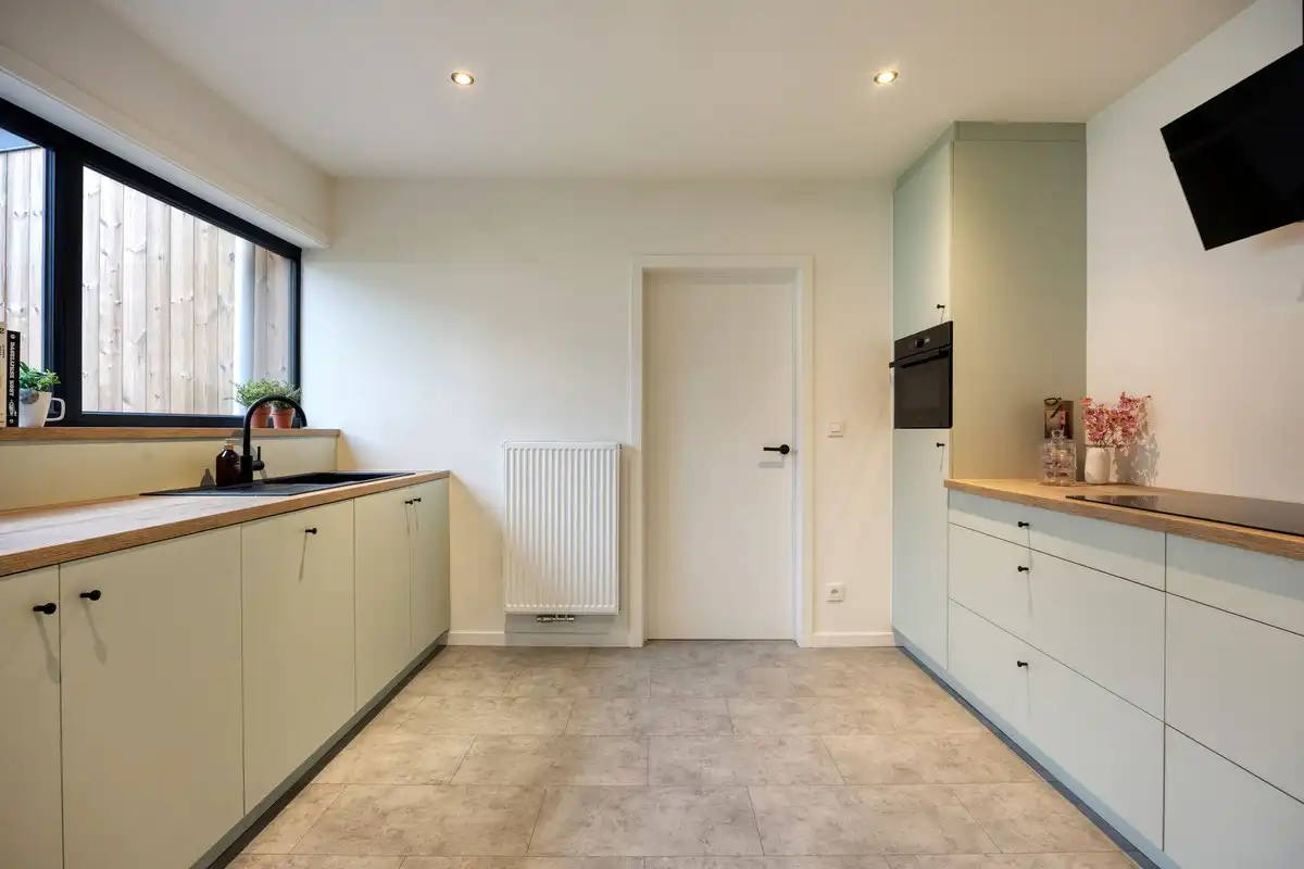 Energiezuinige, volledig gerenoveerde woning met 3 slaapkamers in Ninove foto 8