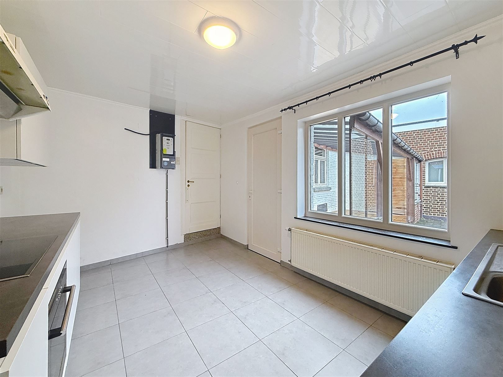 Ruime woning met 4 slpks en verhuurde studio + tuin foto 12