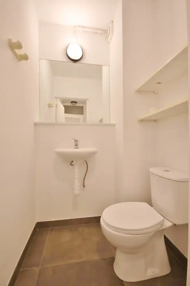 Gunstig gelegen gelijkvloers duplex appartement nabij de Grote Markt foto 10