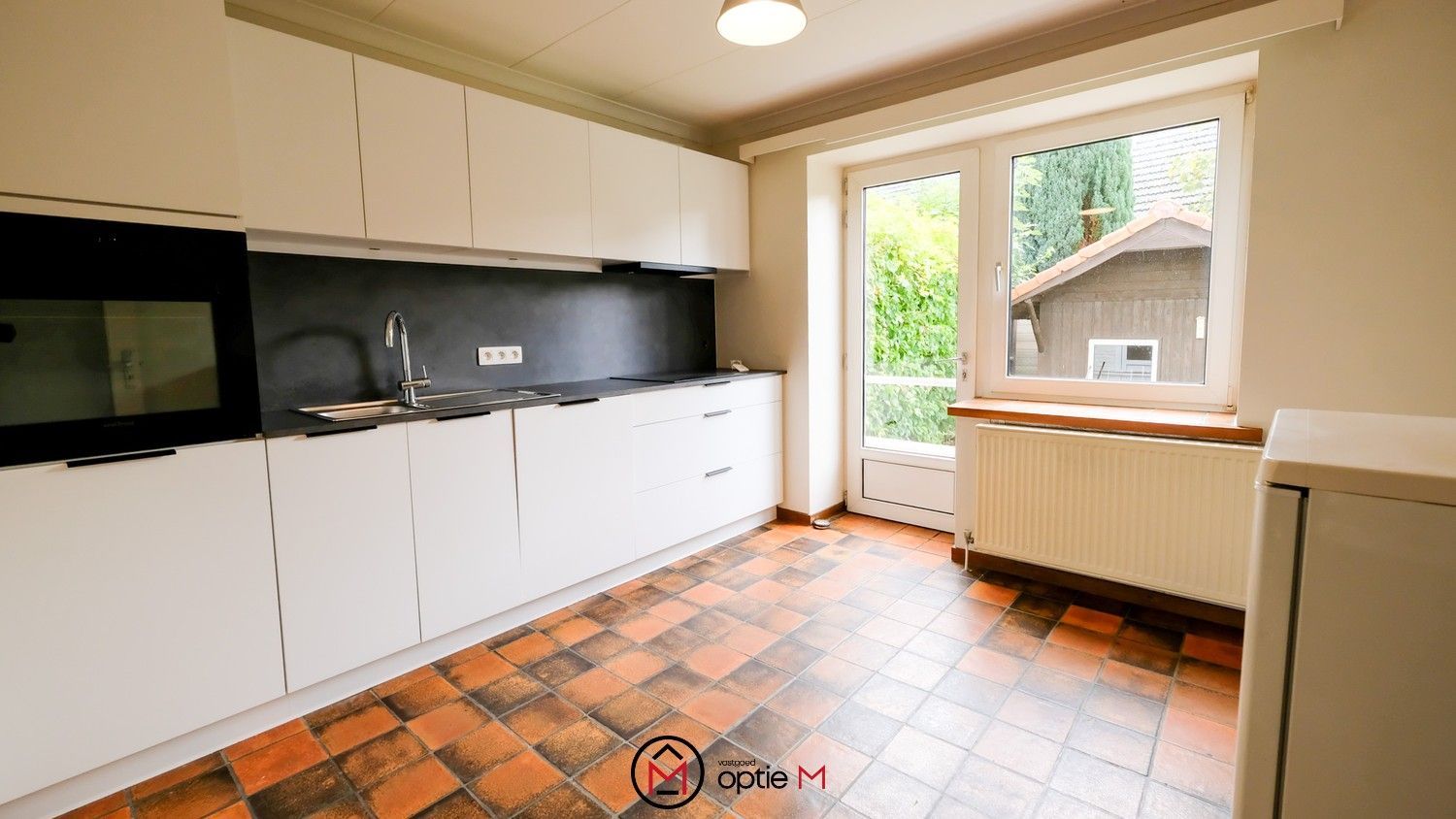 Halfopen woning te huur met tuin en garage in Bilzen foto 4