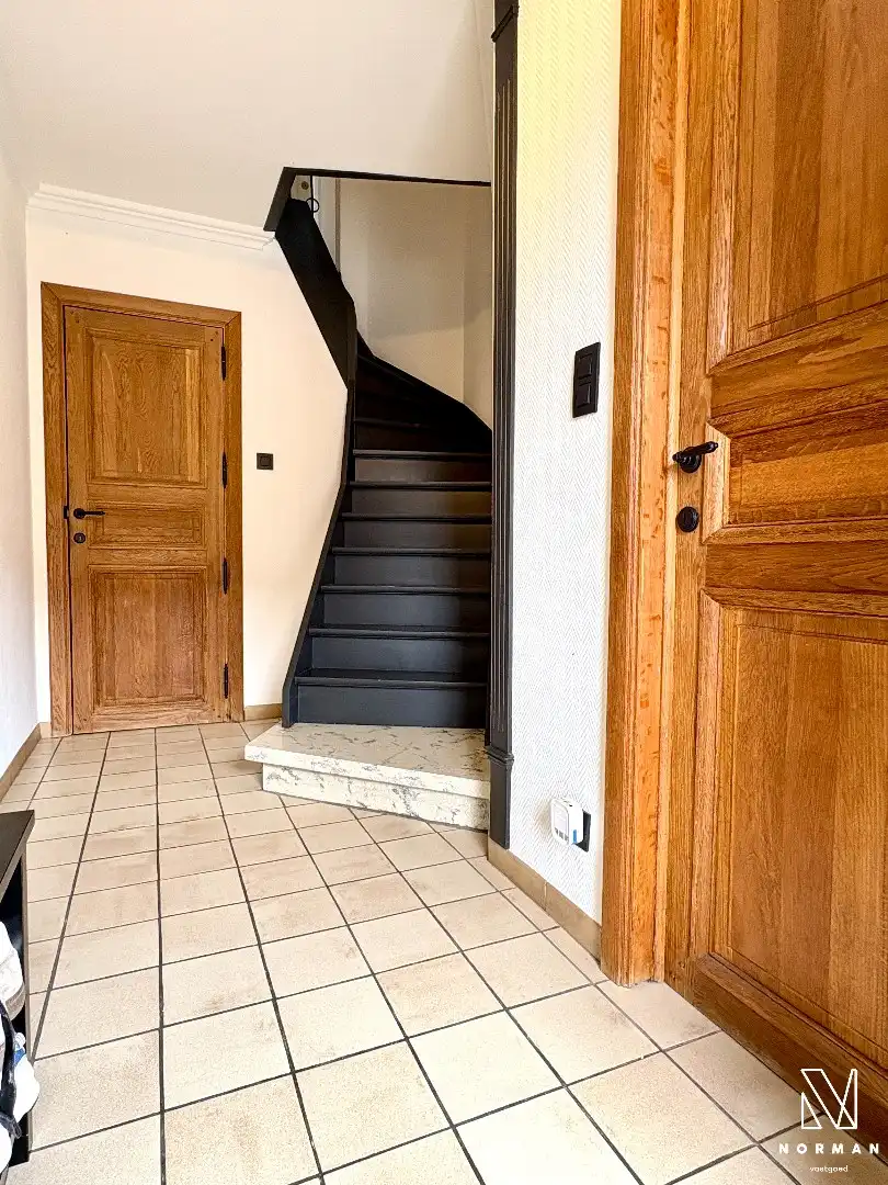 Instapklare woning te koop in rustige woonwijk te Bavikhove met tuin, garage en uitweg! foto 5
