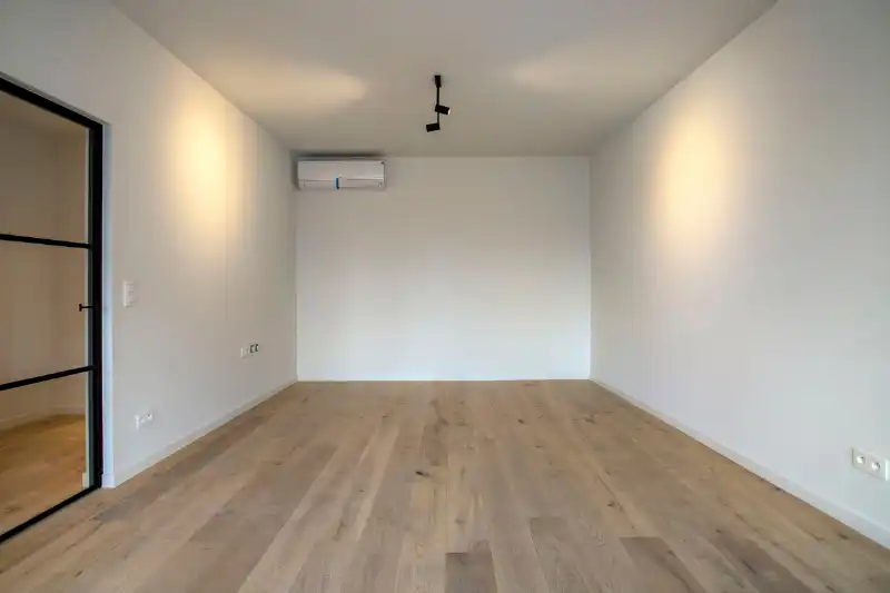 Te huur – stijlvol en energiezuinig appartement in Zeveneken foto 3