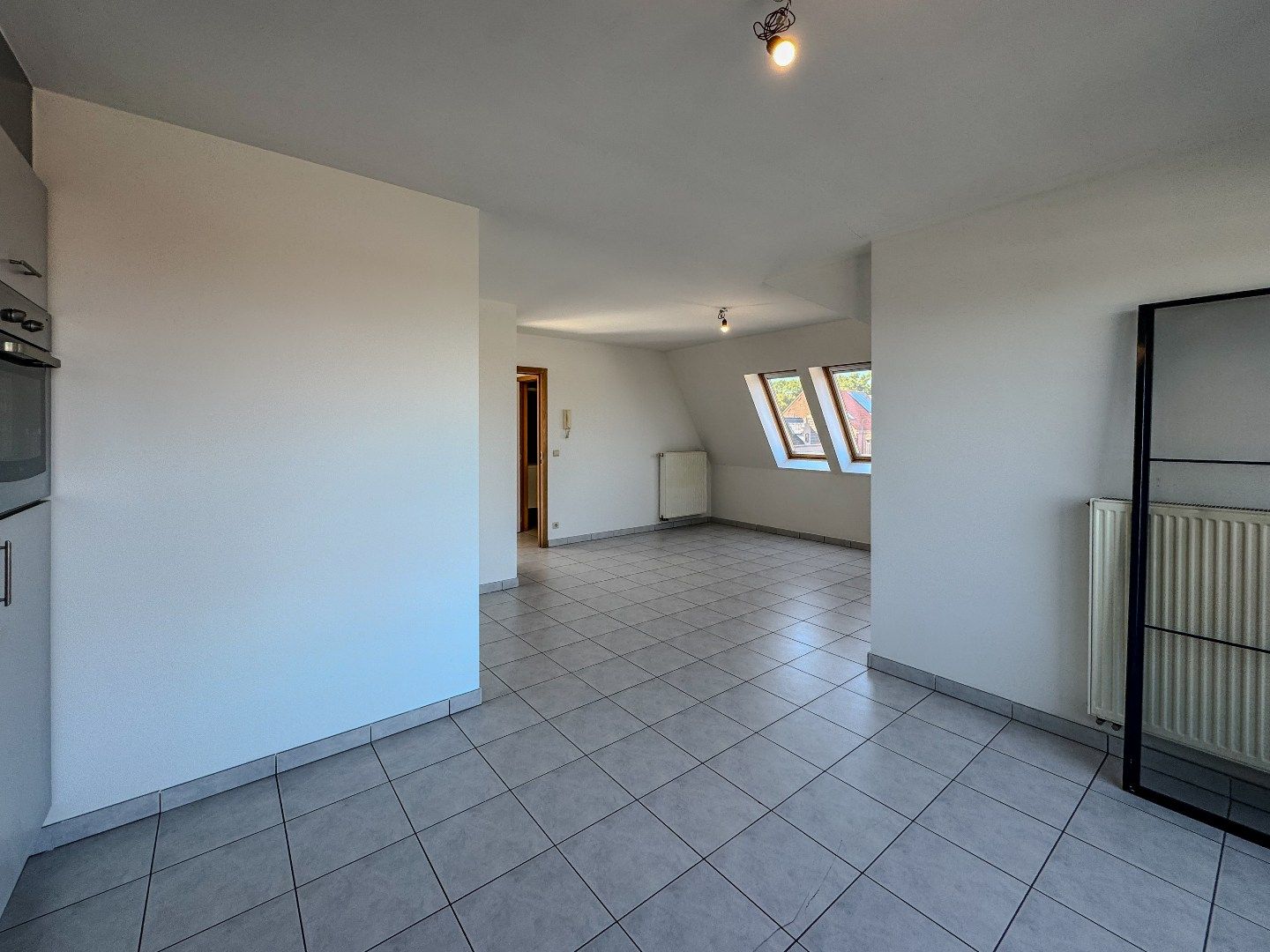 Lichtrijk appartement met 1 slaapkamer, dakterras en garage. foto 7