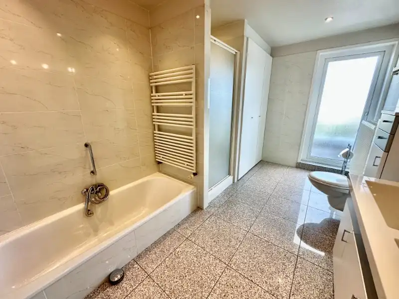 Exclusieve penthouse met 2 slaapkamers, royaal zonneterras en uniek groen uitzicht foto 21