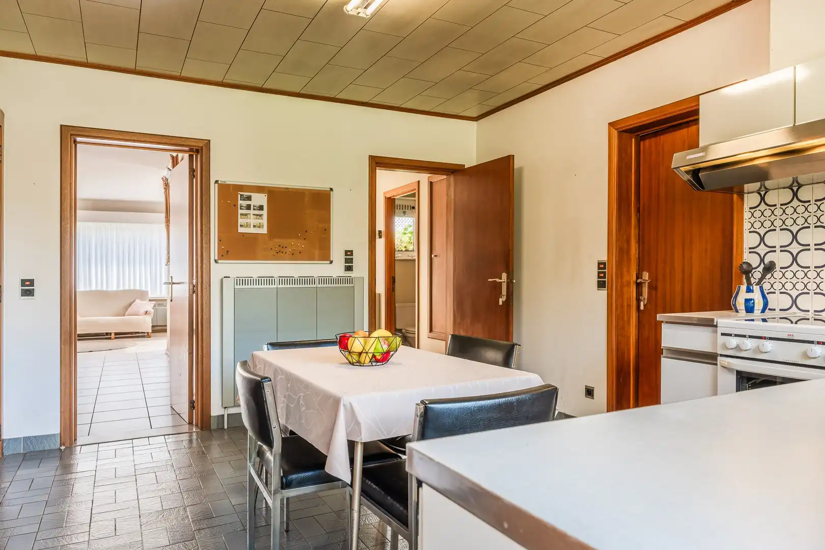 Te renoveren halfopen woning met diepe tuin foto 8