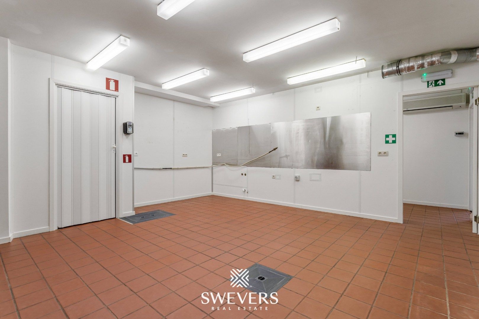 Unieke woon- en handelscombinatie te Lummen centrum foto 11