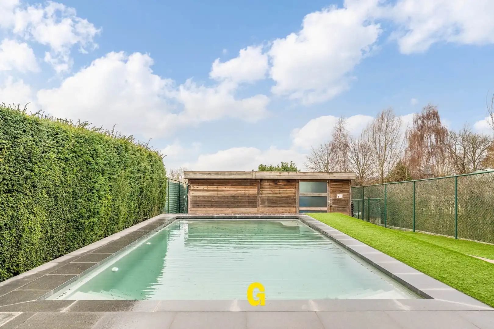 Knappe halfopen woning met zuidwest gerichte tuin met zwembad, rustig gelegen te Kleine Spouwen foto 27