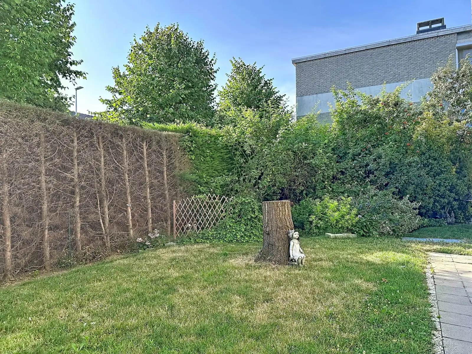 Gelijkvloers hoekappartement met mogelijkheid tot garagebox foto 31