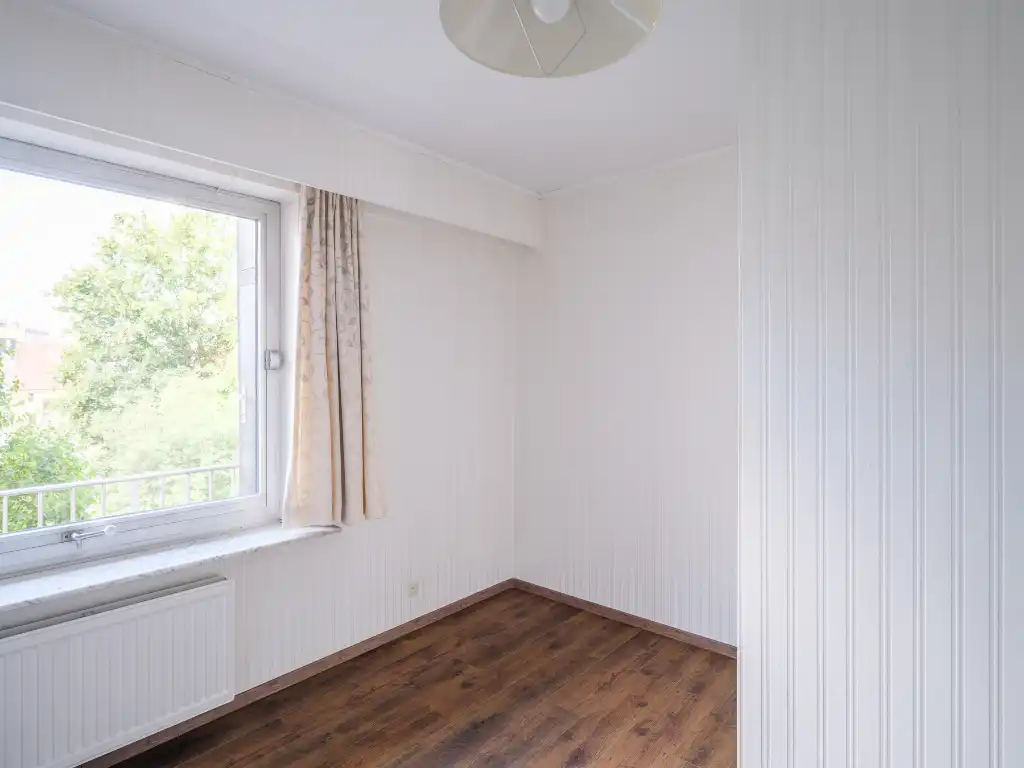 Op te frissen drieslaapkamerappartement met open zicht over het Citadelpark. foto 14