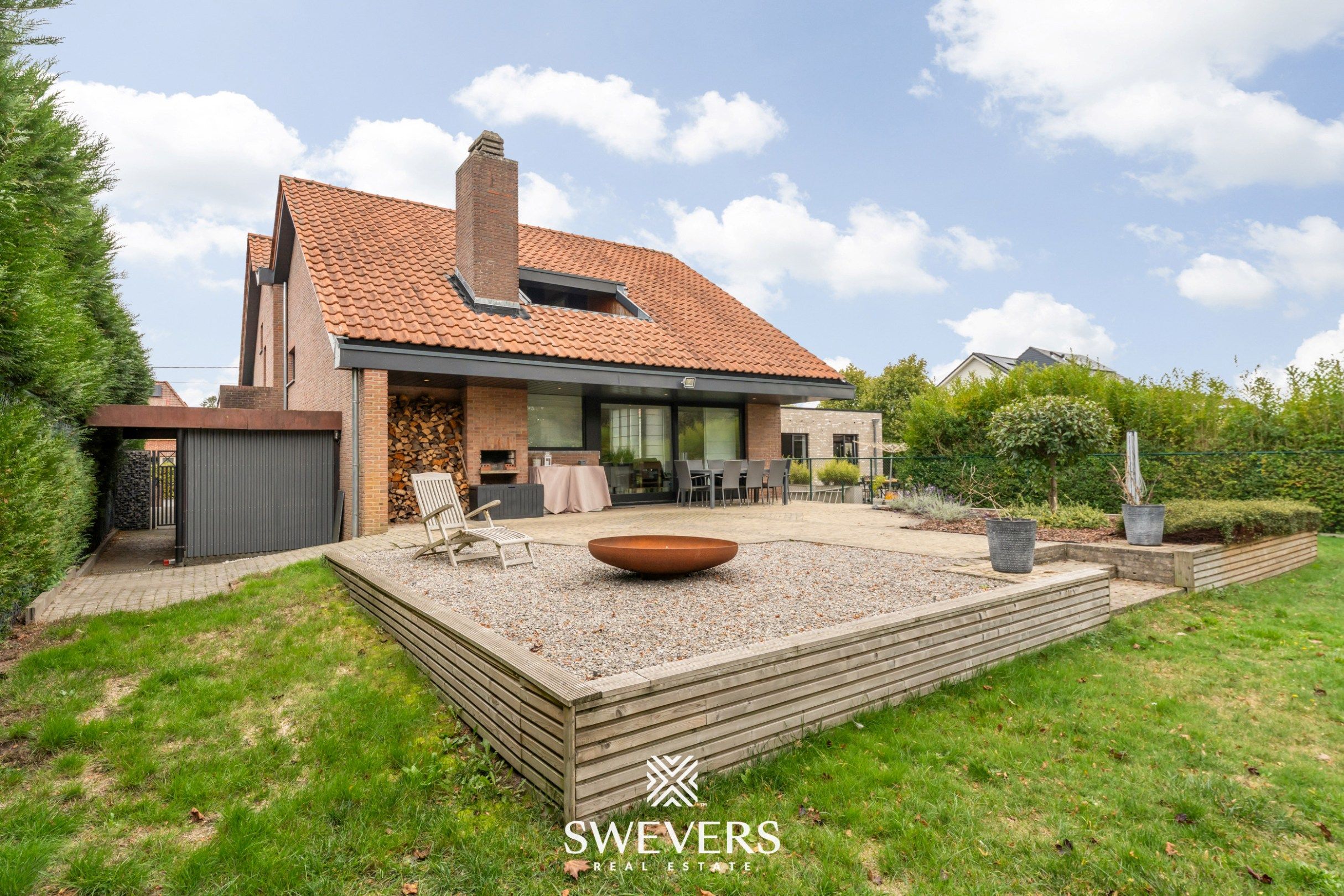 Knusse, hedendaagse gezinswoning met warme indeling en grote, zonnige tuin foto 48