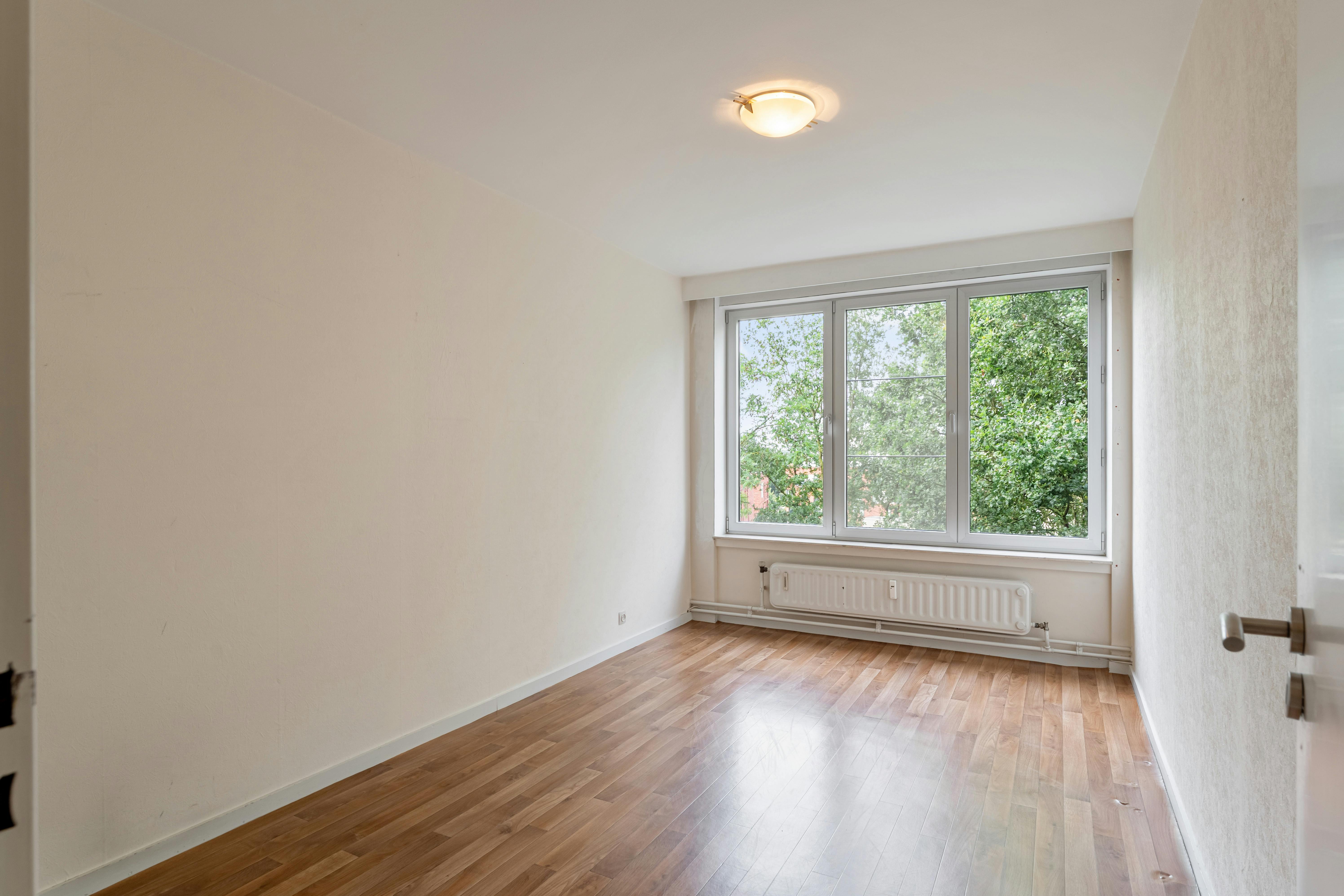 Ruim 3-slaapkamerappartement met terras en garagebox in hartje Genk foto 10