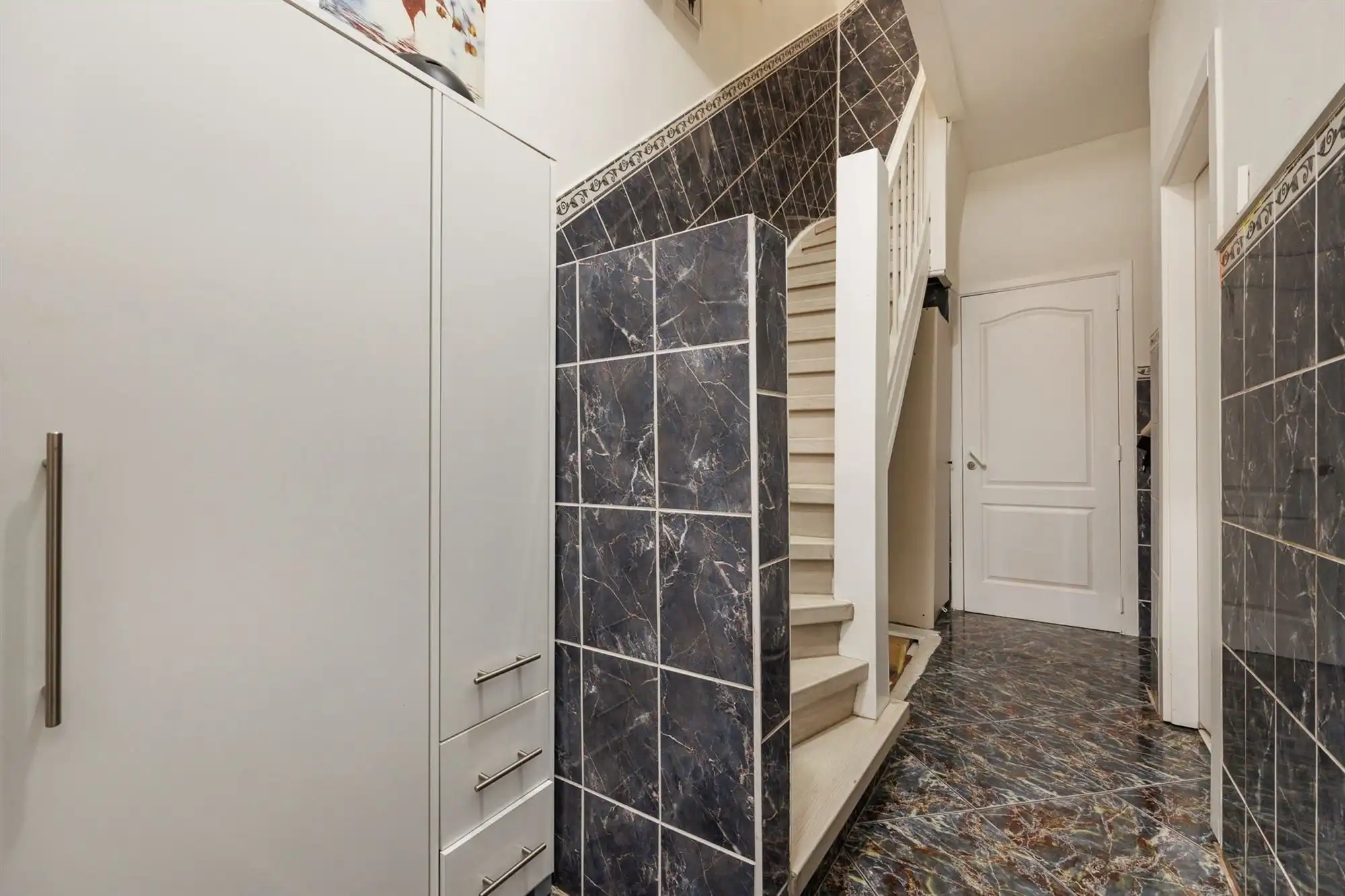 Huis met drie slaapkamers en leuke stadstuin.  foto 2