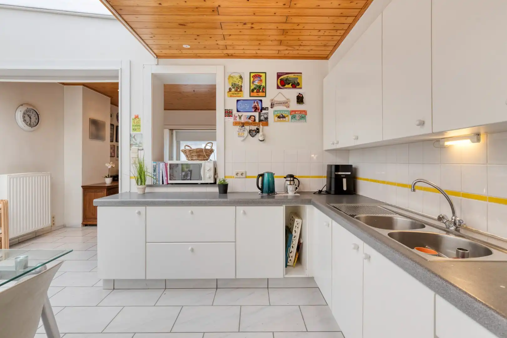 Verzorgde woning met diepe tuin, carport én uitweg! foto 8