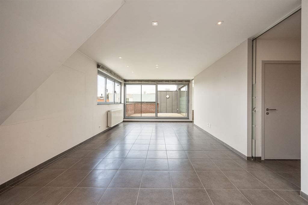 Zeer ruim duplexappartement in hartje Herent! foto 3