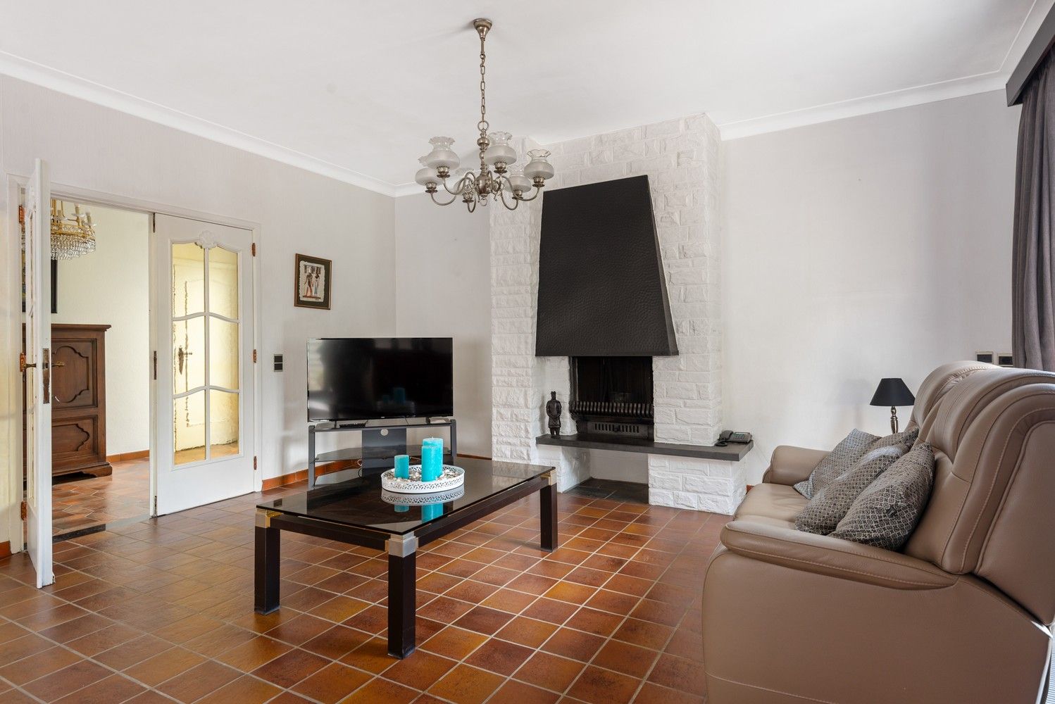 Ruime woning met prachtig onderhouden tuin met verzicht over de velden foto 4