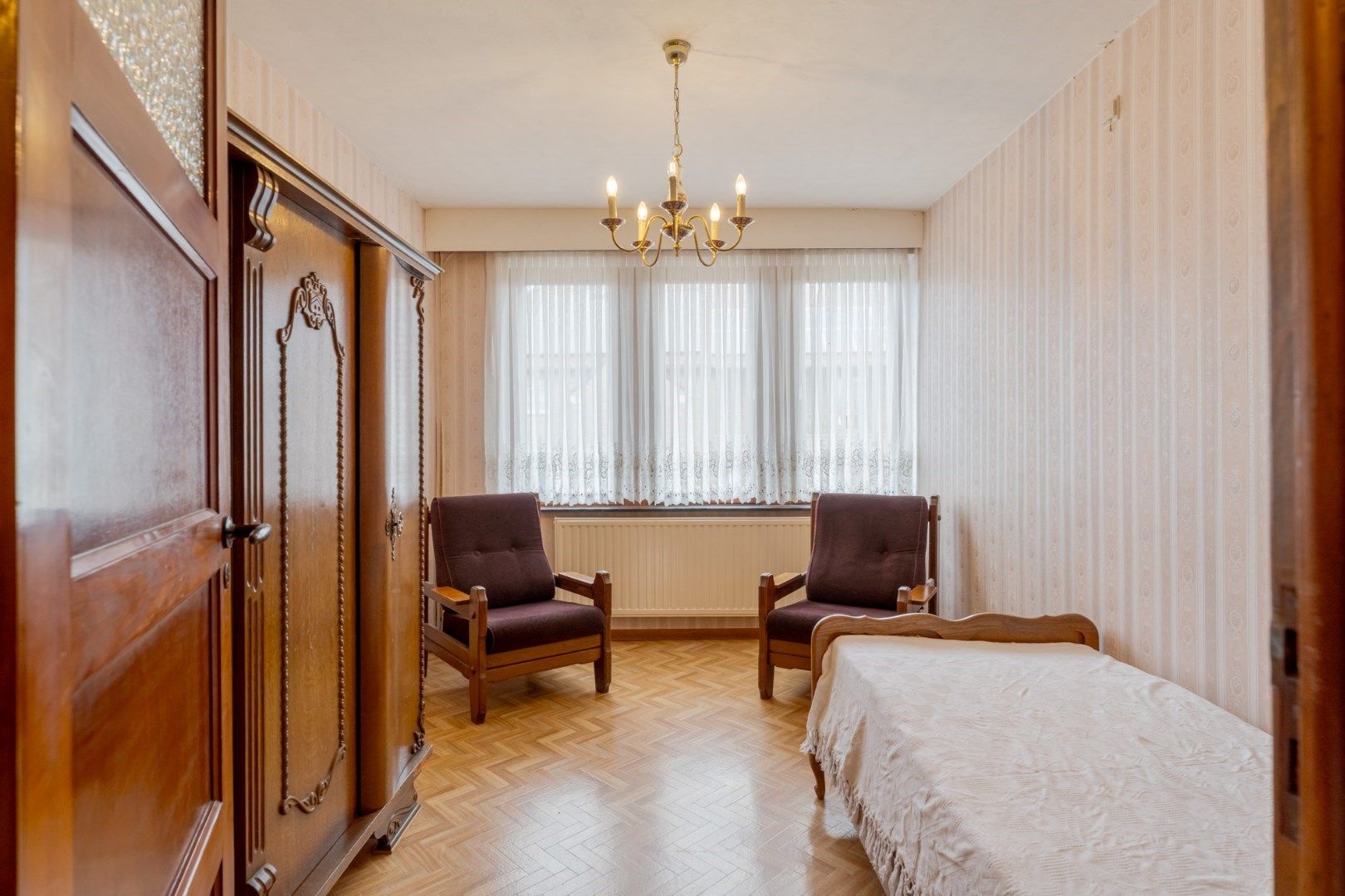 Verzorgde, op te frissen woning met 3 slaapkamers en uitbreidingsmogelijkheden, garage en tuin op 10a, vlak bij het centrum van Hoeselt foto 16