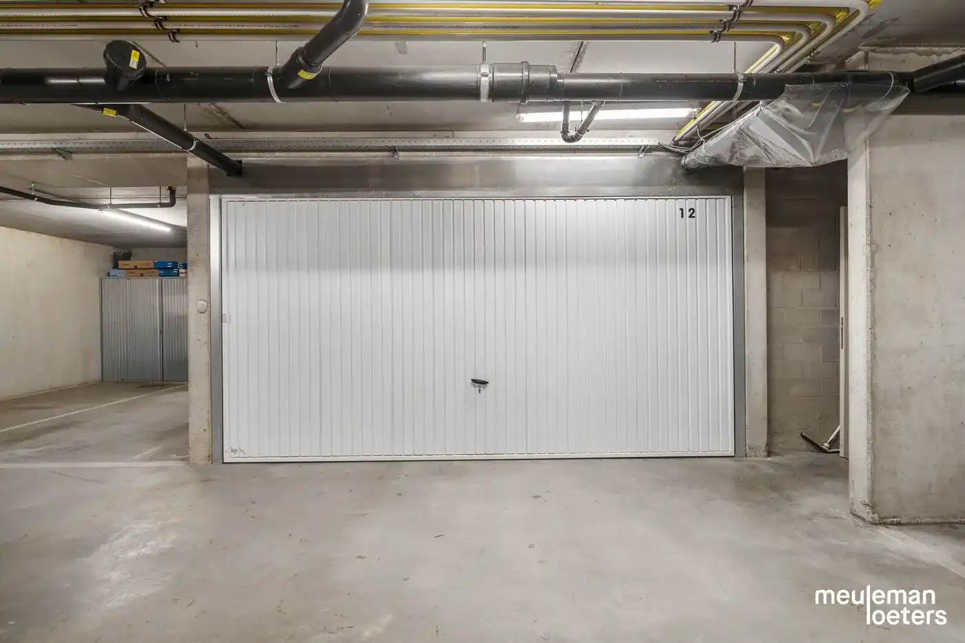 Riant en instapklaar duplexappartement met zéér ruime garagebox in centrum  foto 14