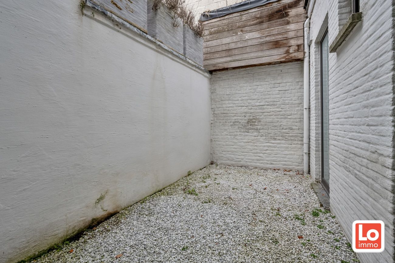 Instapklare stadswoning met potentieel voor vrij beroep op een toplocatie nabij het centrum van Gent! foto 25