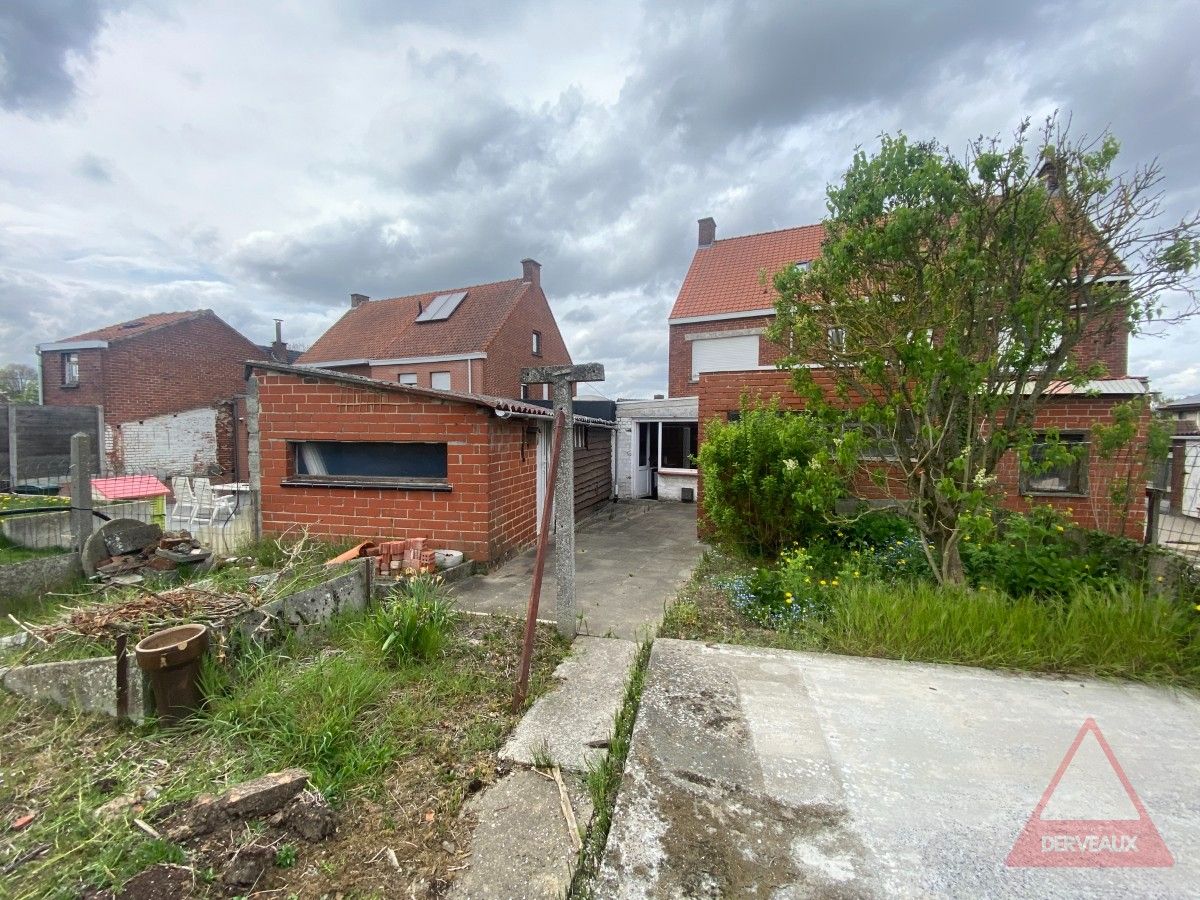 Passendale – Te renoveren woning met tuin, garage en vaste trap naar zolder foto 11