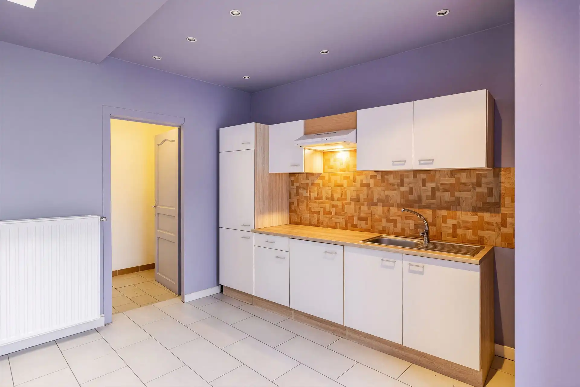 Verhuurde opbrengsteigendom bestaande uit handelspand en duplexappartement in het centrum van Ninove foto 7