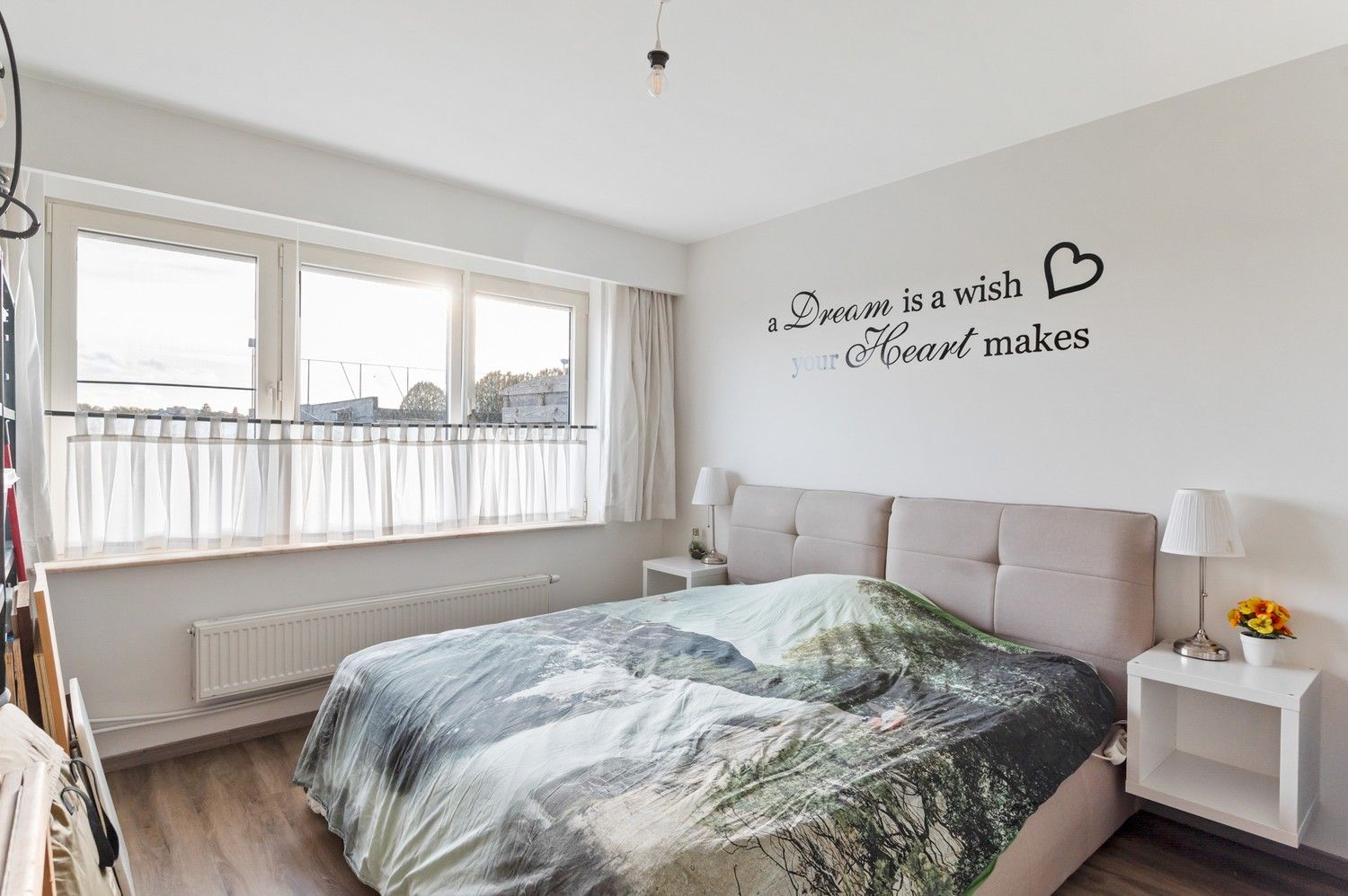 Gelijkvloers appartement met 2 SLPKS, een autostaanplaats en terras in Borgerhout! foto 9