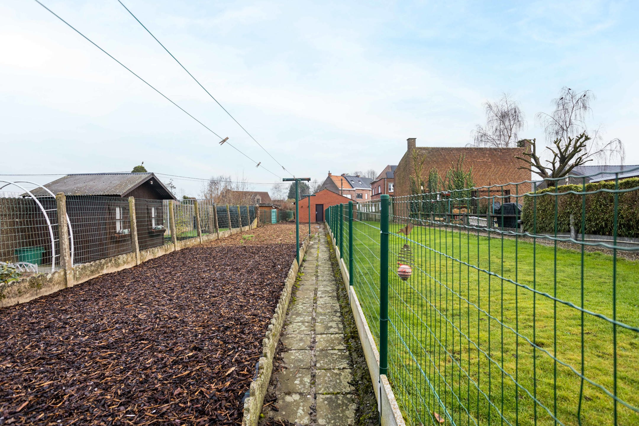 Woning met tuin en achterliggend perceel met oprit & garage! foto 19