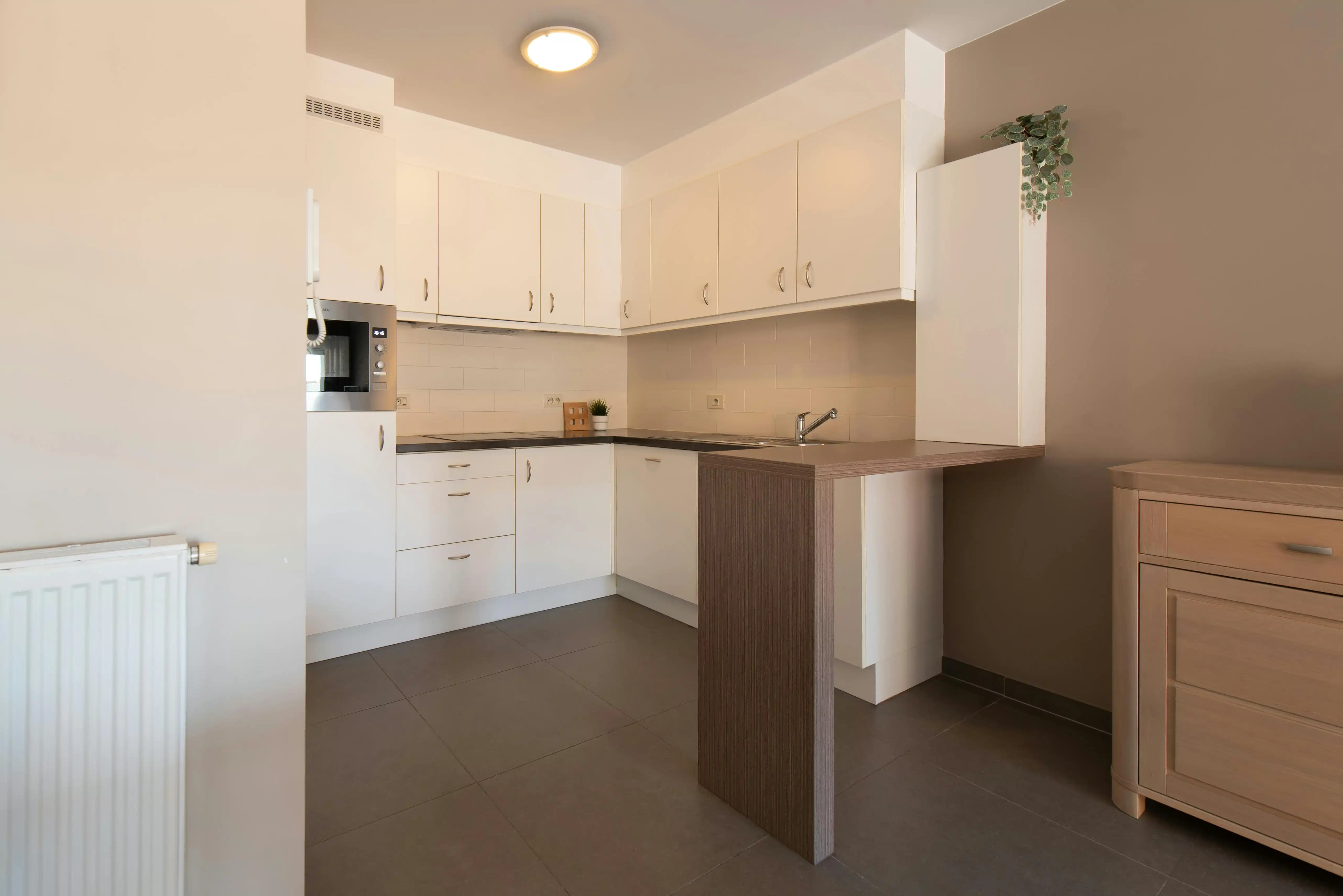 Instapklaar appartement te koop met terras te Oostende foto 21